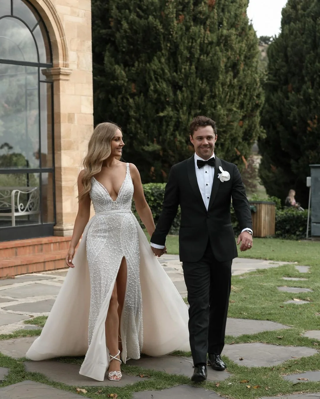 Travis Head with wife Jessica Davies